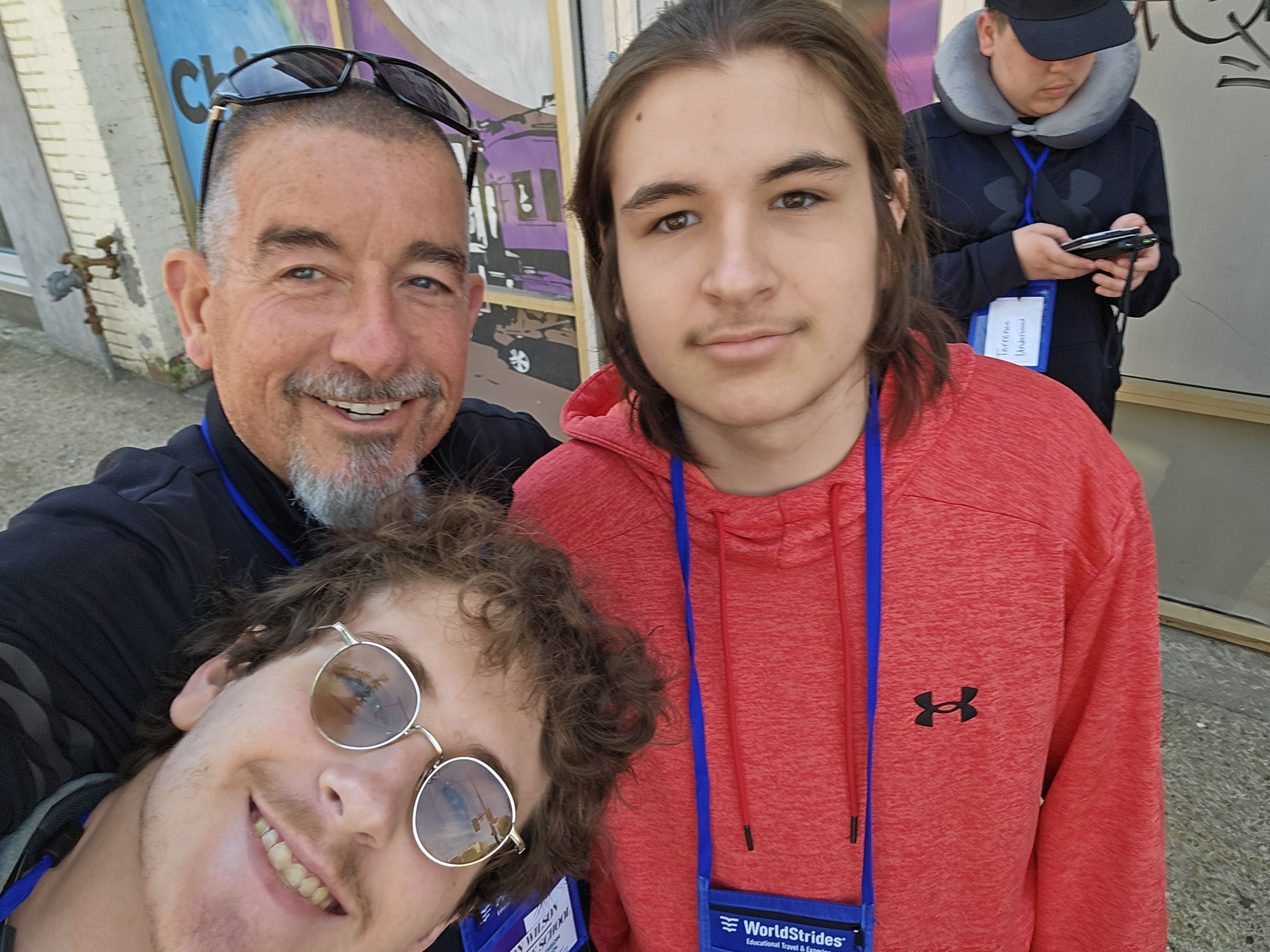 Jon Wilson taking a selfie with two Edison students on the Washington, D.C. trip